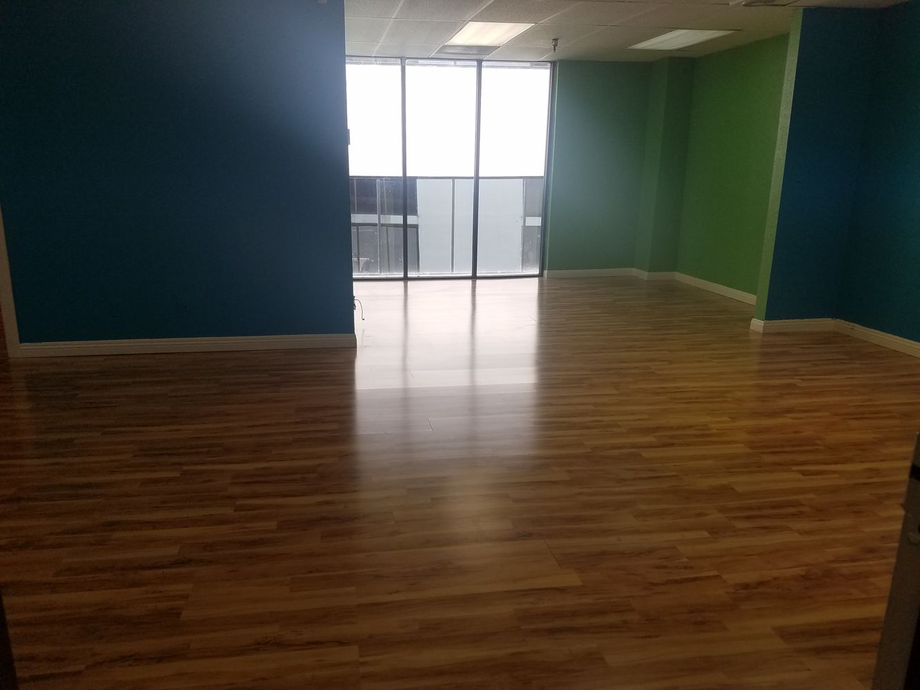 PRIVATE OFFICE AND LARGE OPEN AREA, SEVERAL USES.